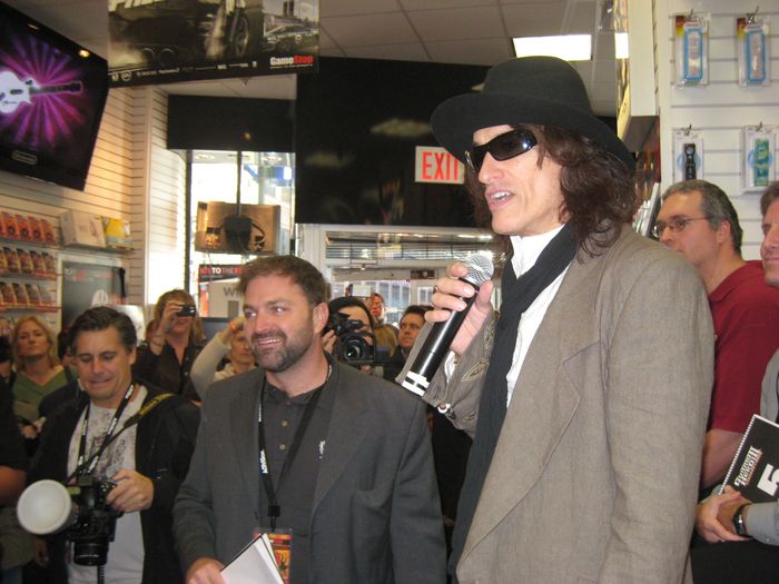 Joe Perry of Aerosmith with Joseph Heilner at the Guitar Hero III tournament — with Joseph Heilner of CatalysCo